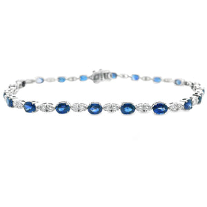 This gorgeous 18k white gold bracelet features round brilliant cut ...