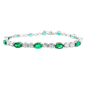 This beautiful 18k white gold bracelet features 24 round brilliant ...