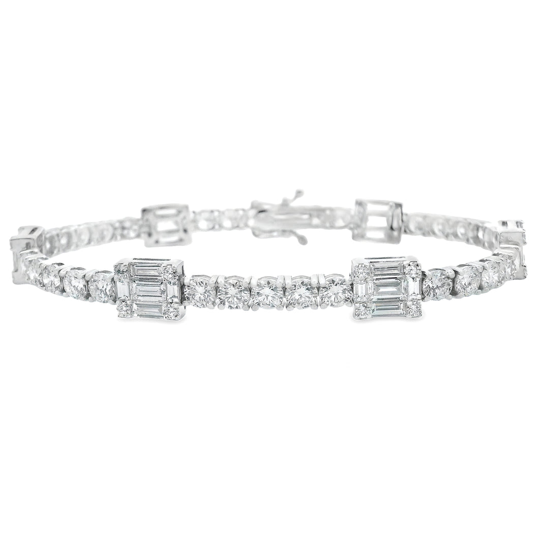 This beautiful 18k white gold diamond bracelet features baguette cu...