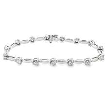 This 14k white gold diamond bracelet features 15 round brilliant cu...