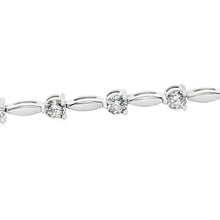 This 14k white gold diamond bracelet features 15 round brilliant cu...