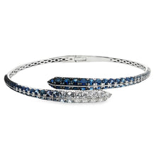 18k white gold cuff bangle features round brilliant cut diamonds an...