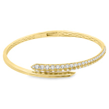 18k yellow gold cuff bangle features 56 round brilliant cut diamond...