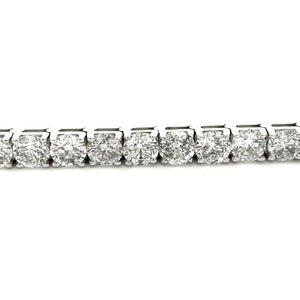 This beautiful 18K white gold diamond bracelet features approx. 29 ...
