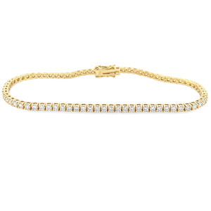 This 18k yellow gold bracelet features 75 round brilliant cut diamo...