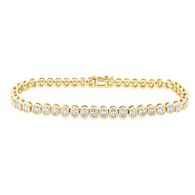 This beautiful 18k yellow gold bracelet features bevel set oval cut...