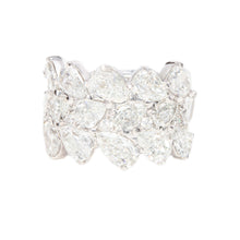 This stunning 18k white gold ring features 3 rows of diamonds. The ...