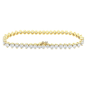 This beautiful 18k yellow gold bracelet features 44 round brilliant...