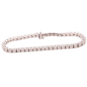 This 18k white gold diamond bracelet features 48 round brilliant cu...