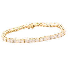 This beautiful 18k yellow gold bracelet features 42 round brilliant...