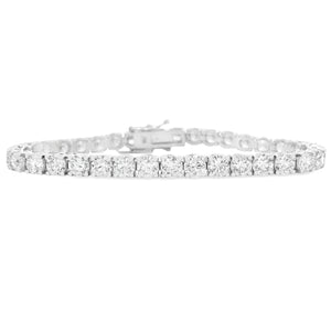 This beautiful 18k white gold bracelet features 35 round brilliant ...