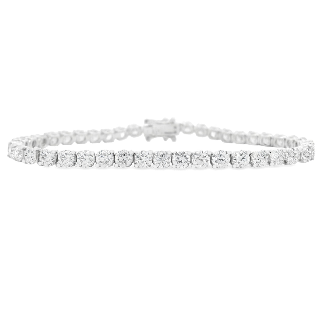 This 18k white gold diamond bracelet features 43 round brilliant cu...