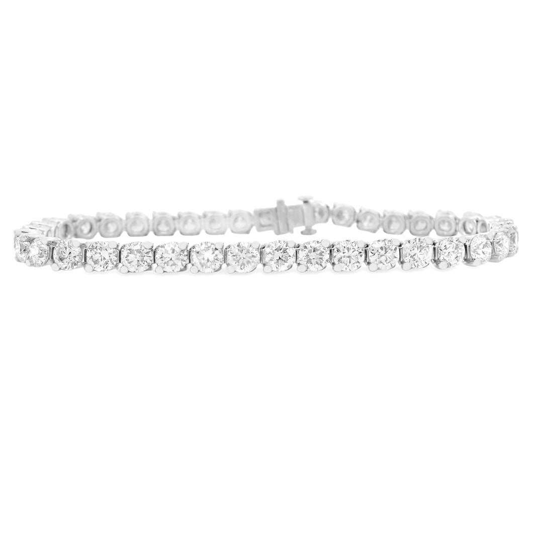 This platinum diamond bracelet features 40 round brilliant cut diam...