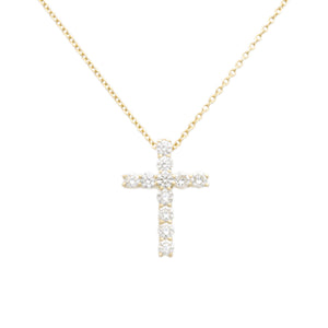 This 14k yellow gold necklace features a cross pendant featuring ro...