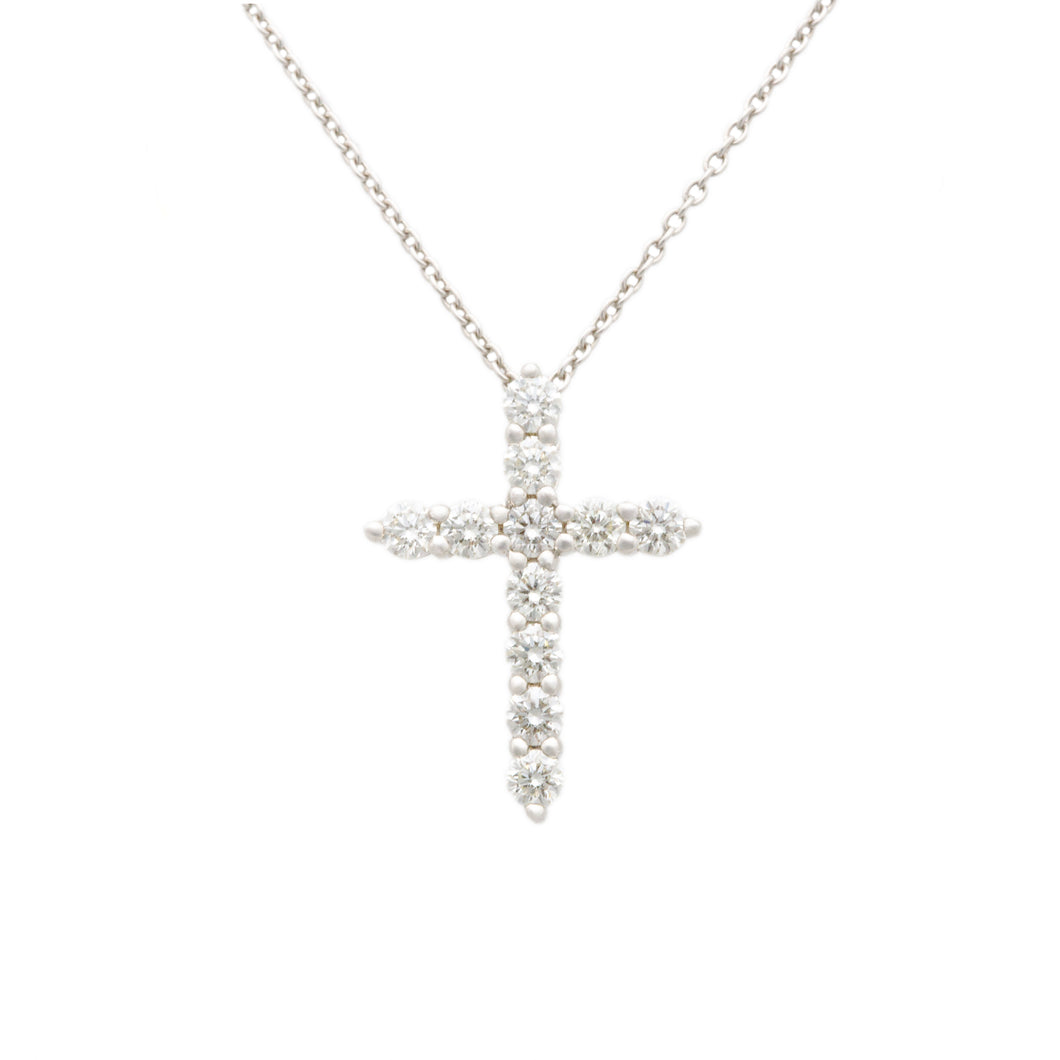 This 14k white gold necklace features a cross pendant featuring rou...