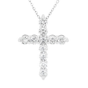 This large 18k white gold necklace features a cross pendant featuri...