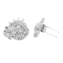 Estate piece: Platinum diamond brooch. Can be worn as a single broo...