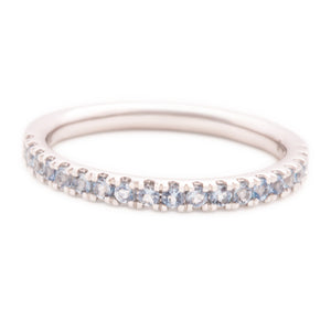 This 14k white gold band features aquamarine stones that wrap half ...