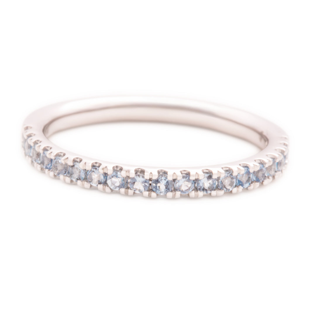 This 14k white gold band features aquamarine stones that wrap half ...