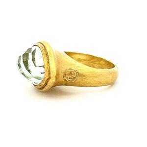 18k yellow gold ring features a gorgeous mint topaz.