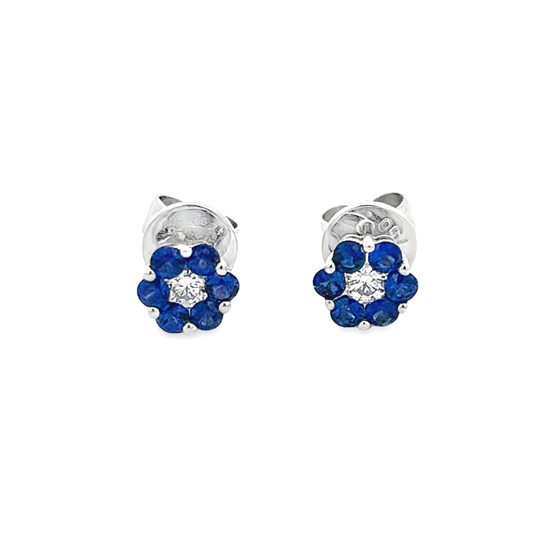 These dainty 18k white gold earrings feature sapphires and diamonds...