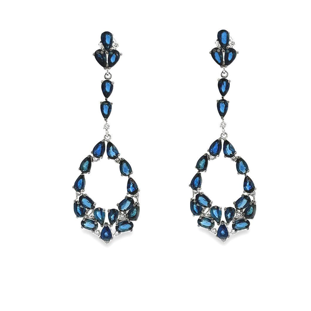 These stunning 18k white gold drop earrings feature sapphires total...
