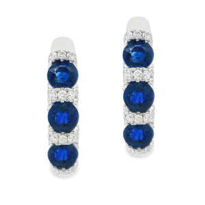 These beautiful 18k white gold huggy earrings feature 88 round bril...