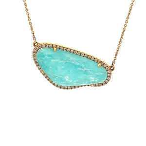 This beautiful 18k yellow gold pendant features clear quartz/amazon...
