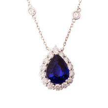 This beautiful 18k white gold necklace features a stunning pear sha...