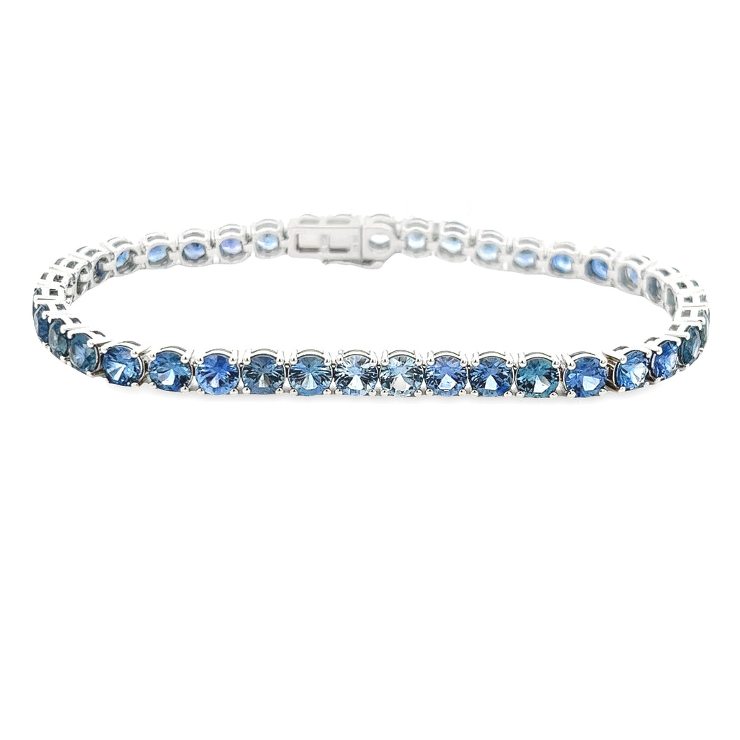 This beautiful 14k white gold bracelet features 48 sapphires in var...