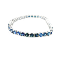 This beautiful 14k white gold bracelet features 48 sapphires in var...