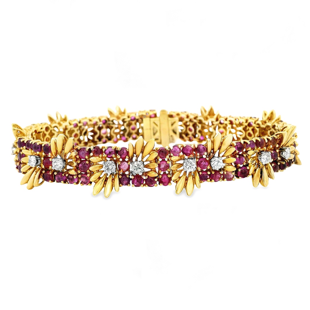 Estate piece: 14k yellow gold diamond and ruby bracelet. 
Diamonds:...