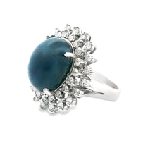 Estate piece: 14k white gold diamond and cabochon sapphire ring 
Di...