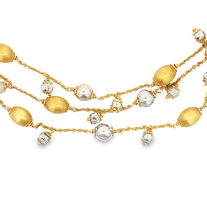 14k Yellow & White Gold Triple Bead Necklace. Necklace measures...