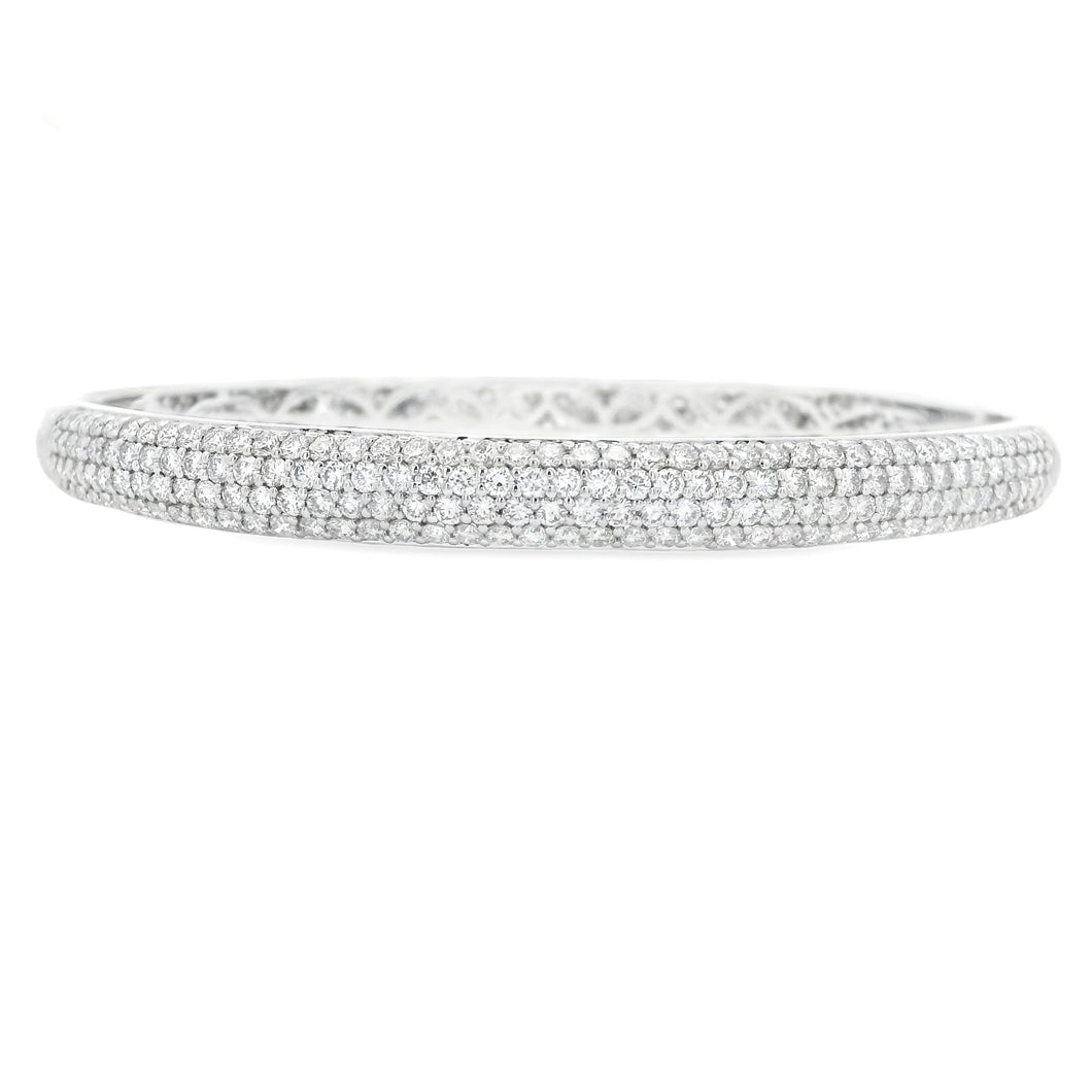 This beautiful 18k white gold bangle features 172 pave-set round br...