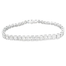 This stunning 18k white gold diamond bracelet features baguette and...