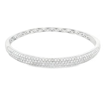 This beautiful 18k white gold bangle features 172 pave-set round br...