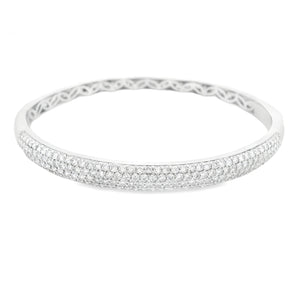 This beautiful 18k white gold bangle features 172 pave-set round br...