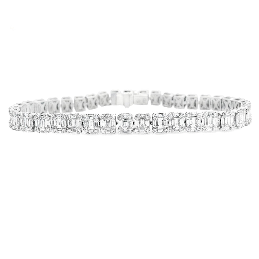 This stunning 18k white gold diamond bracelet features baguette and...