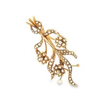 14k yellow gold flower pin with pearls.