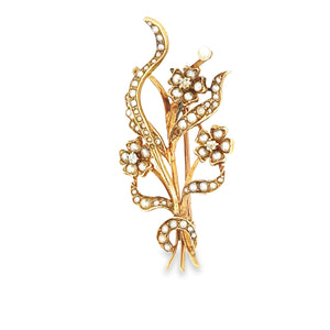 14k yellow gold flower pin with pearls.