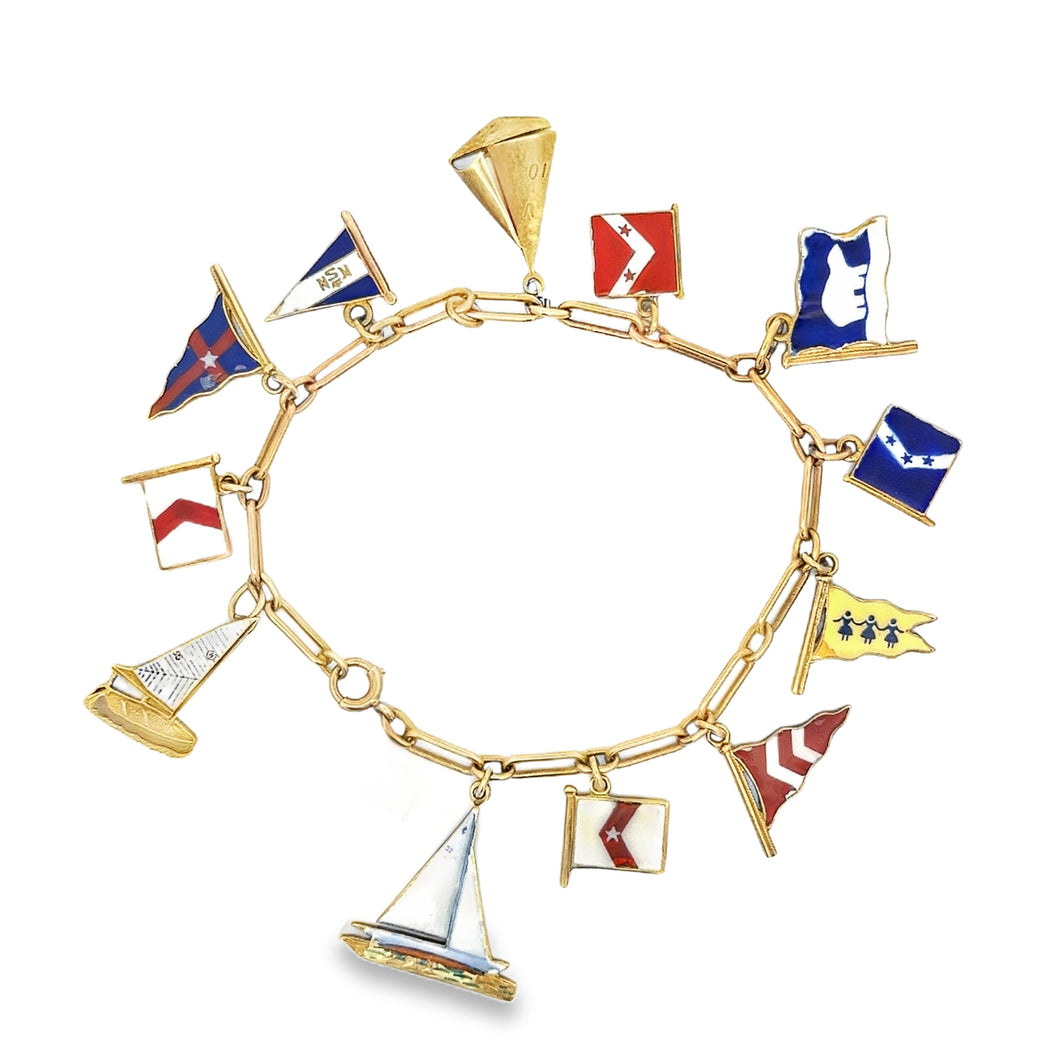Estate piece: 14k yellow gold bracelet with nautical flags and sail...