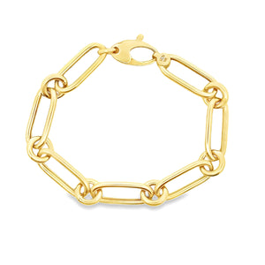 14K yellow gold bracelet with oval and circle links.
Measures appro...