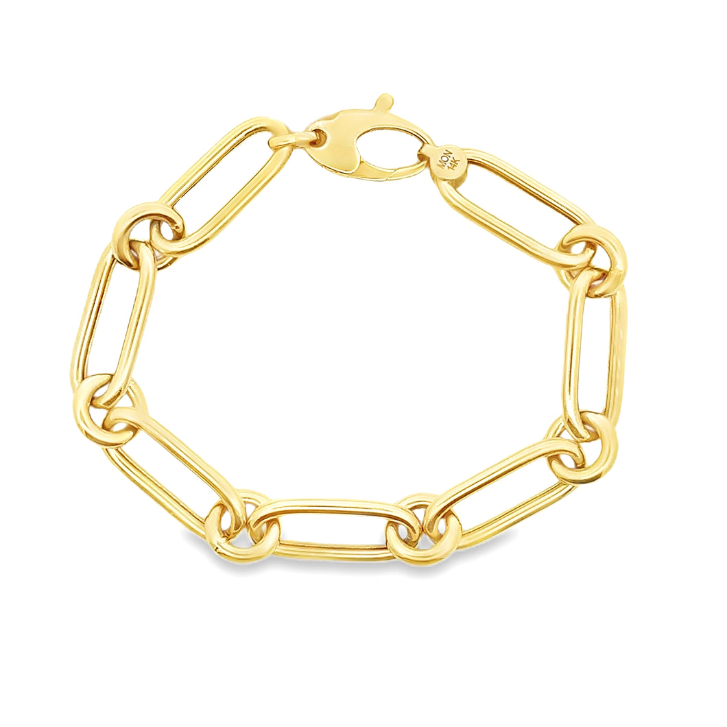 14K yellow gold bracelet with oval and circle links.
Measures appro...