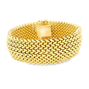 Estate piece: 14k yellow gold wide mesh bracelet. 
Bracelet measure...