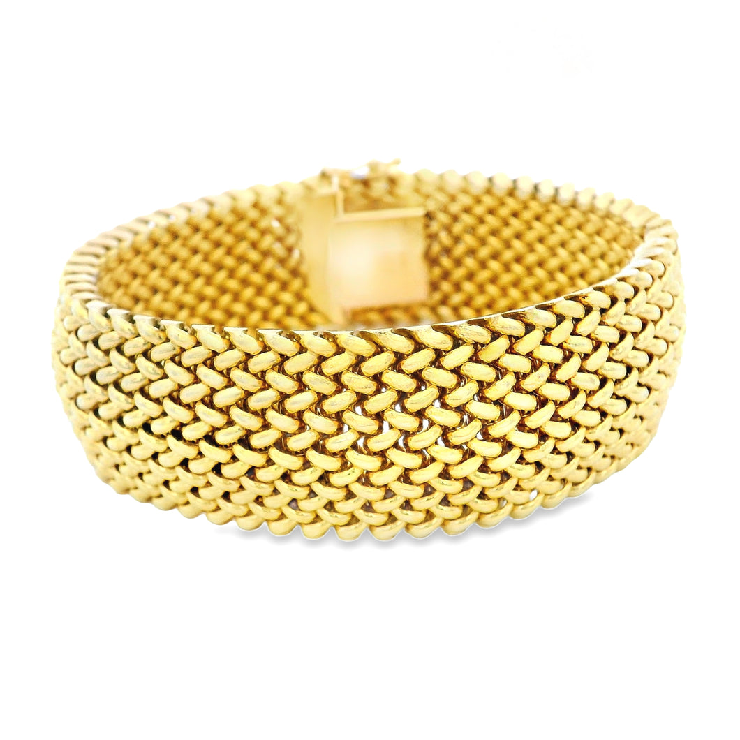 Estate piece: 14k yellow gold wide mesh bracelet. 
Bracelet measure...