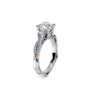 This Verragio ring is an intricately woven diamond band three-stone...