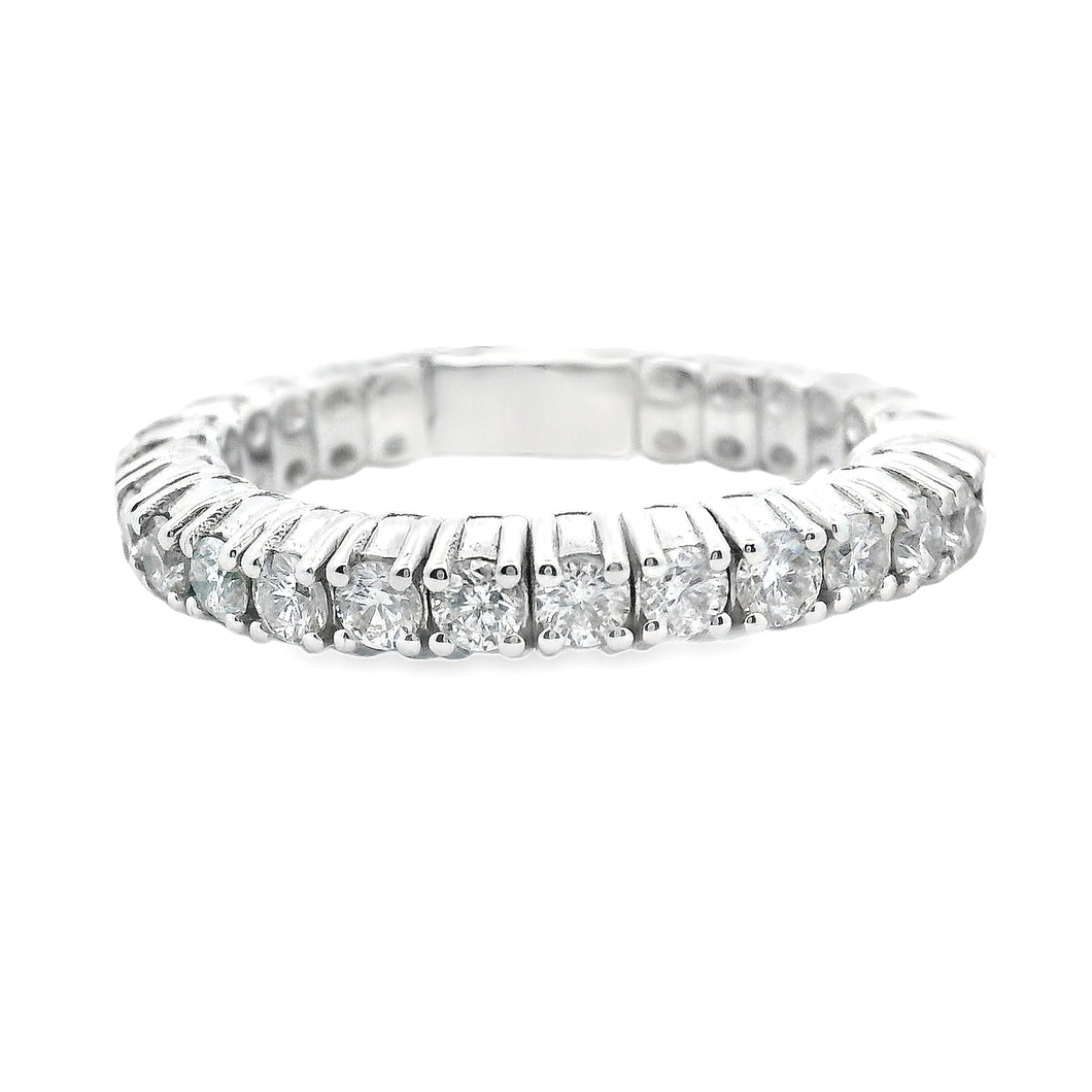 Estate piece: 18k white gold stretch diamond band
Diamonds: Round b...