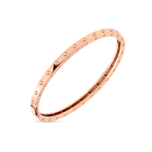 Pois Moi Oval Bangle. Available in 18k Yellow Gold, White Gold and ...