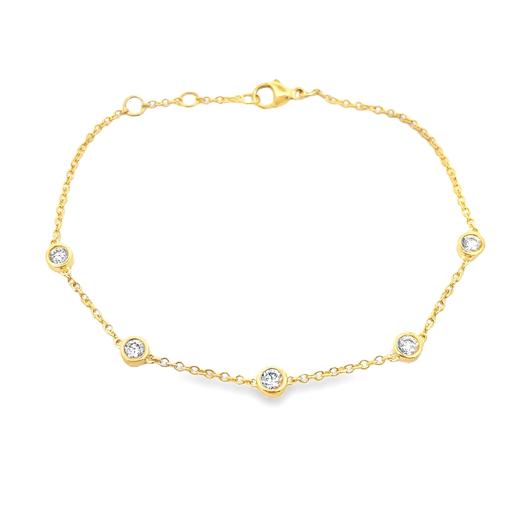 This beautiful 14k yellow gold bracelet features 5 bezel-set round ...